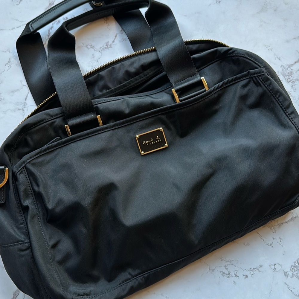 Brand new Agnes B. Black bag.
